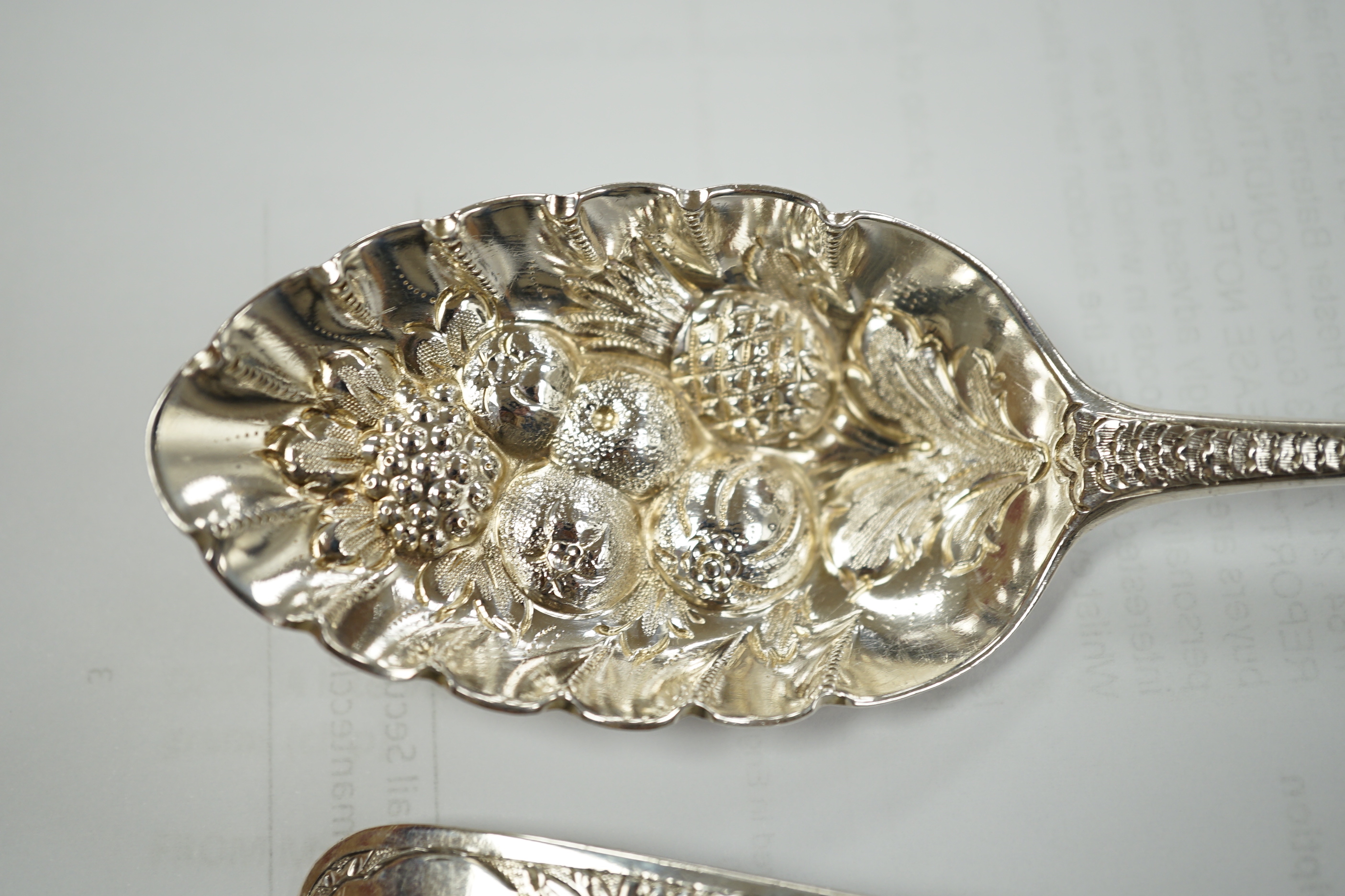 A pair of George III silver Old English pattern 'berry' spoons by Hester Bateman, London, 1784, 21.7cm, 3.6oz.